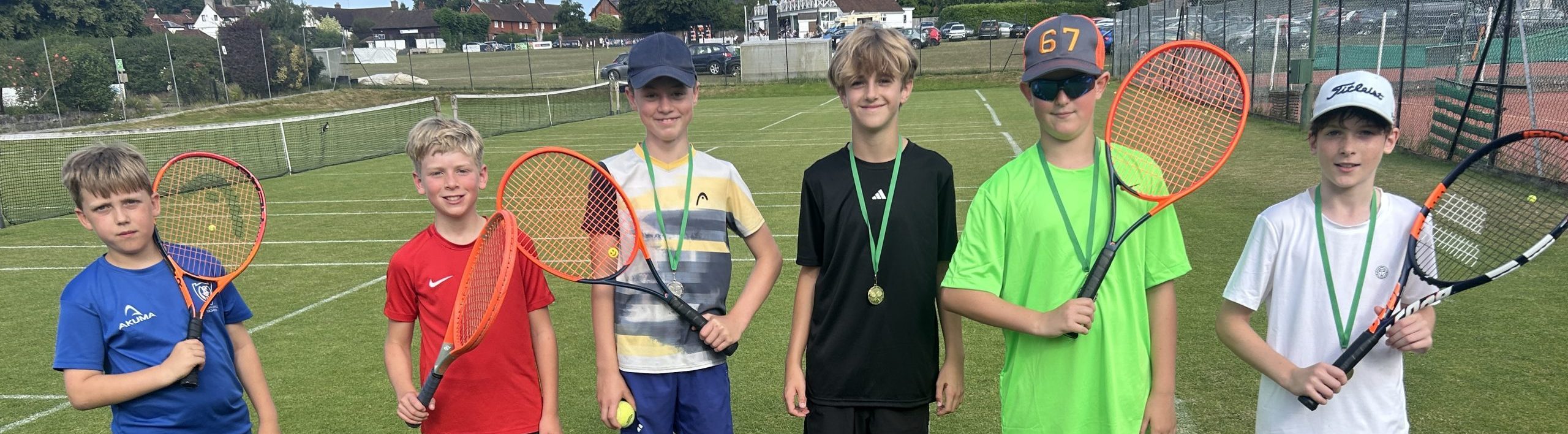 Children competing in the Reigate Priory Junior Tennis Championships 2026